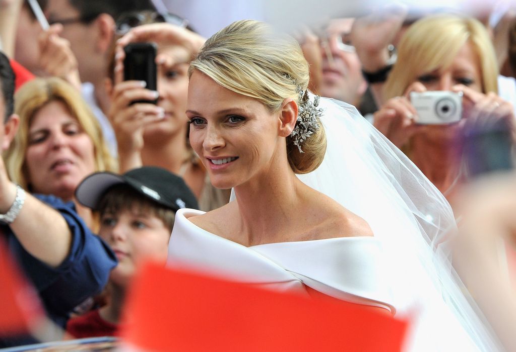 Princess Charlene of Monaco smiling in her wedding dress