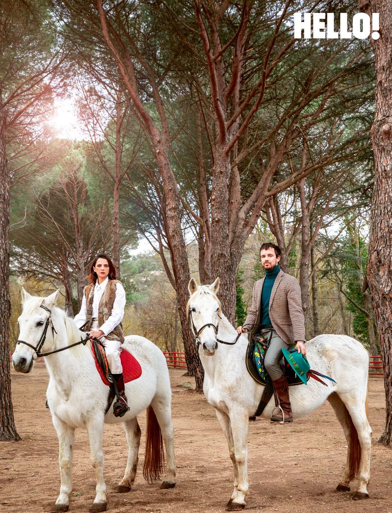 Macarena Gómez and Aldo Comas riding two of their pet white horses