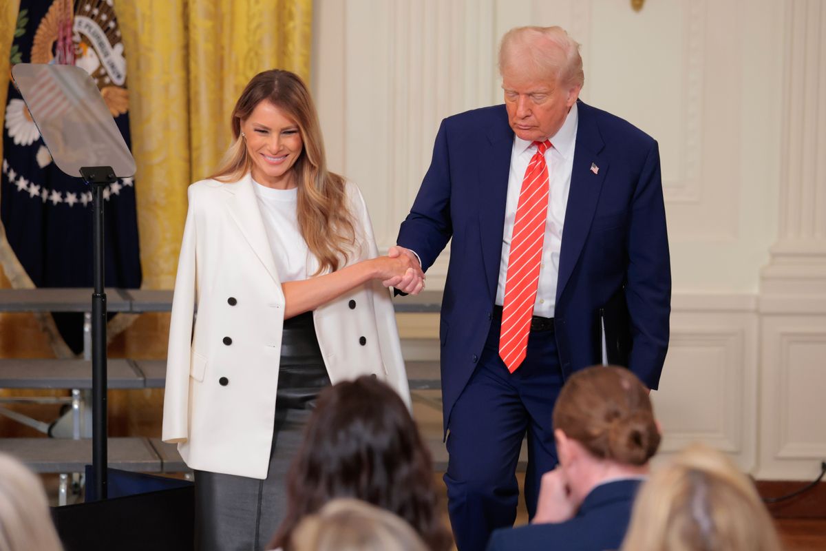WASHINGTON, DC - MAY 08: U.S. President Donald Trump and first lady Melania Trump during an event to celebrate Military MothersÂ in the East Room of the White House on May 08, 2025 in Washington, DC. Mrs. Trump, who has maintained a lower profile during President Trumpâs second administration, will later host a postal stamp unveiling for former first lady Barbara Bush. (Photo by Anna Moneymaker/Getty Images)
