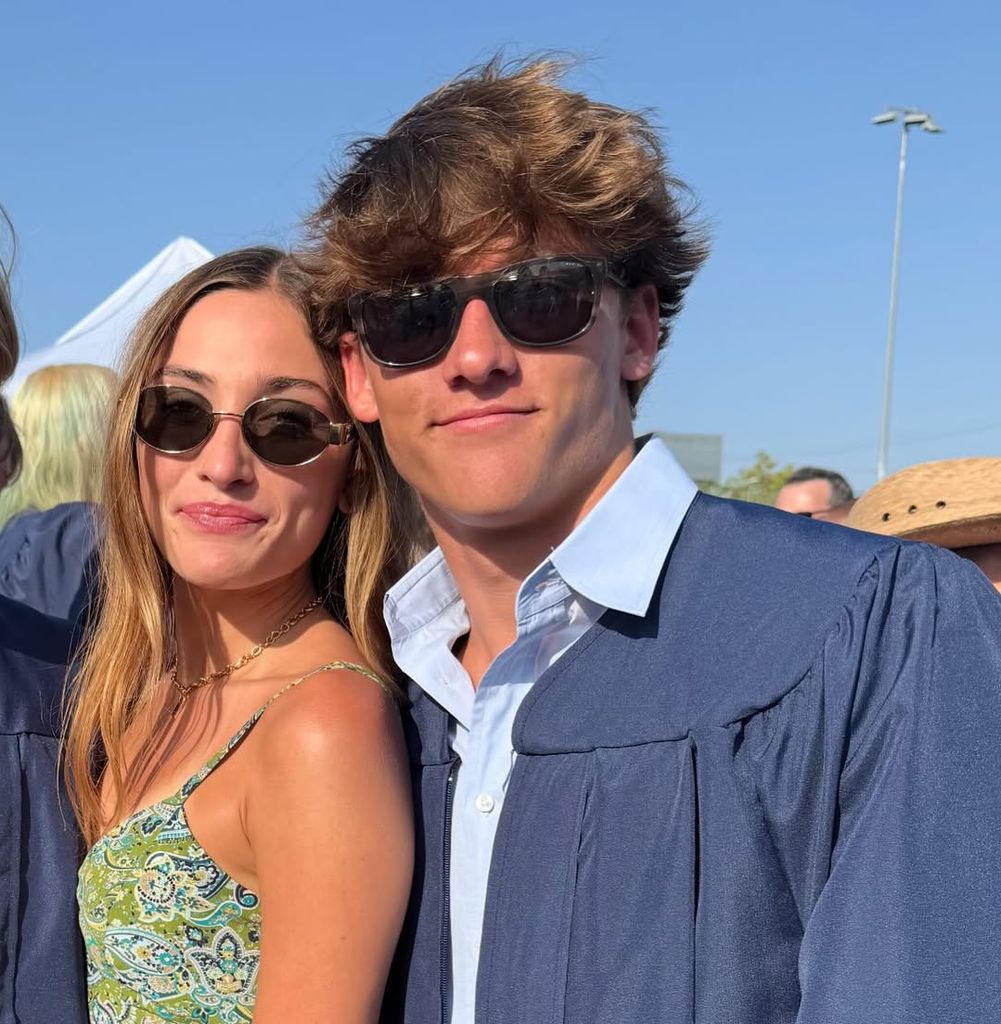 Talula Dempsey and Darby Dempsey pose at his high school graduation 