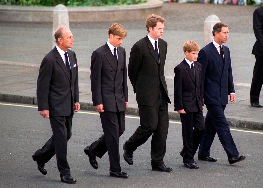 Princes Philip, William, Harry, Charles and Earl Spencer walking in a line at Princess Diana's funeral