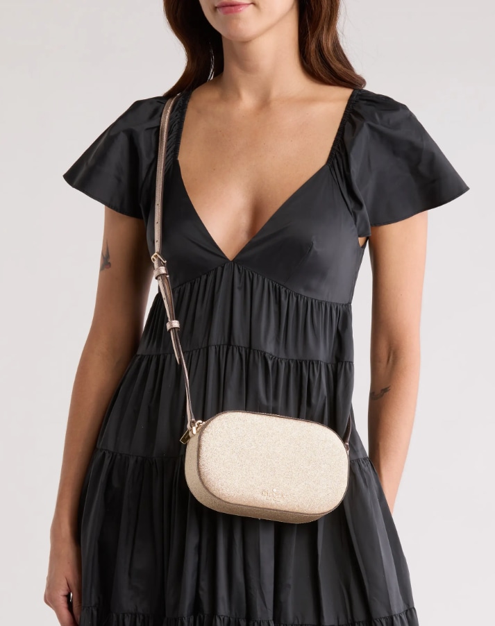 Kate Spade New York glimmer oval camera bag,