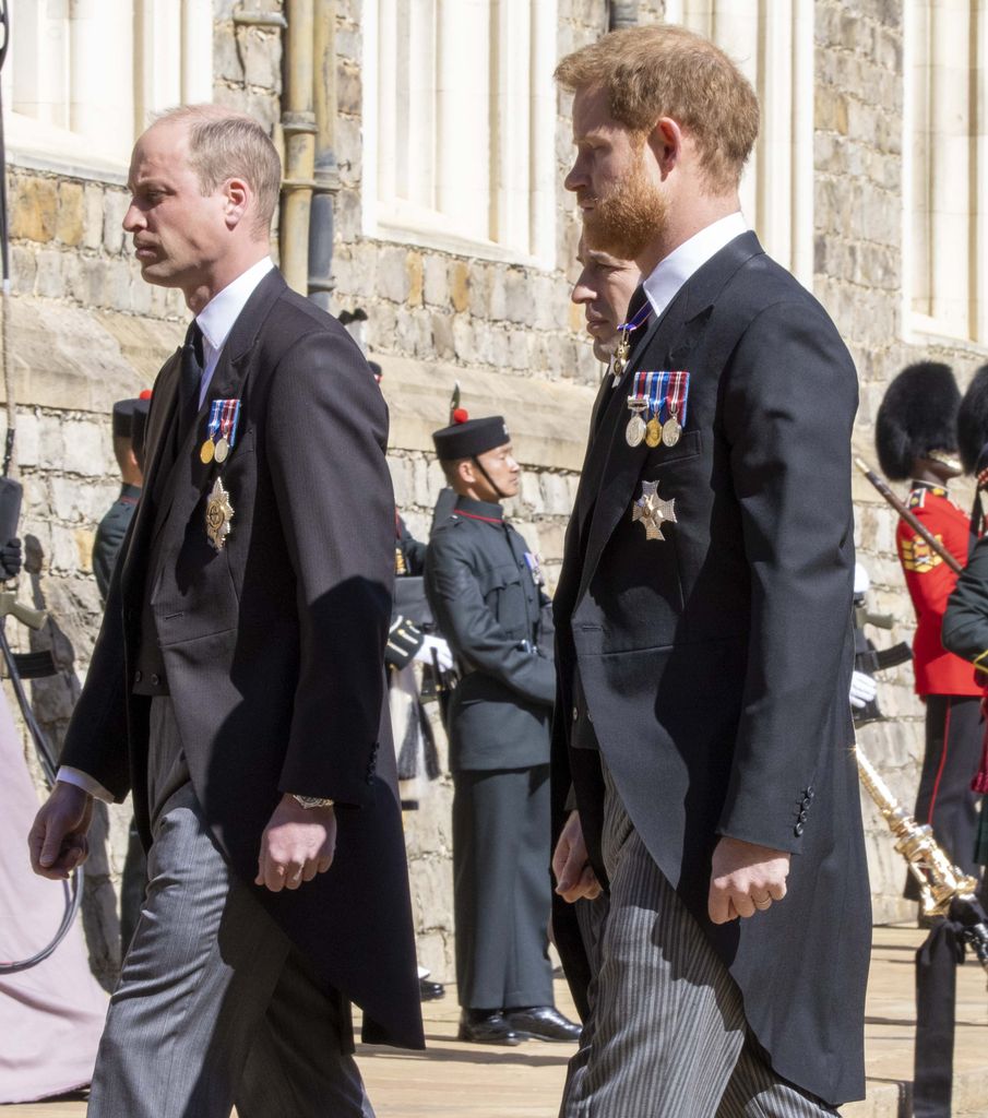 Prince William and Harry walking side by side at the funeral of Prince Philip