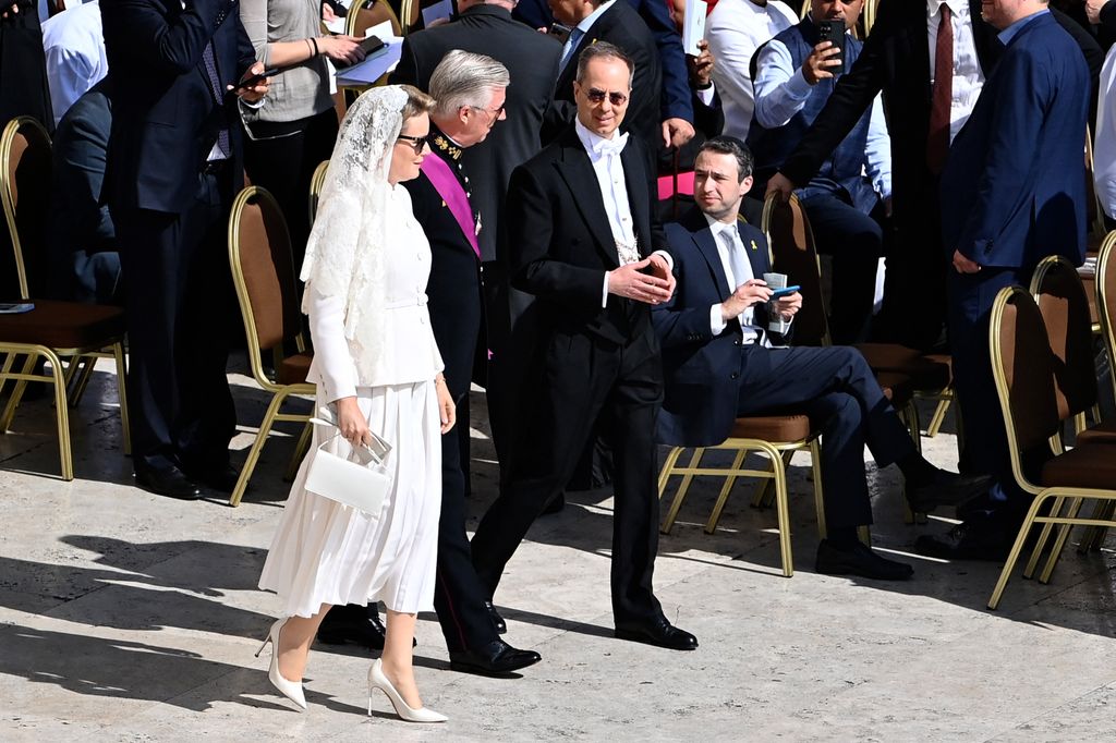Belgium's King Philippe - Filip and Belgium's Queen Mathilde arrive to attend a Holy Mass for the Beginning of the Pontificate of Pope Leo XIV, in St Peter's square in The Vatican on May 18, 2025. (Photo by Isabella BONOTTO / AFP) (Photo by ISABELLA BONOTTO/AFP via Getty Images)          