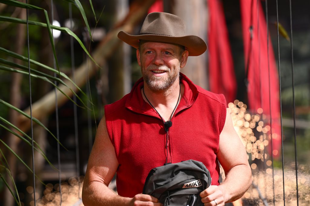 Mike Tindall walking across bridge