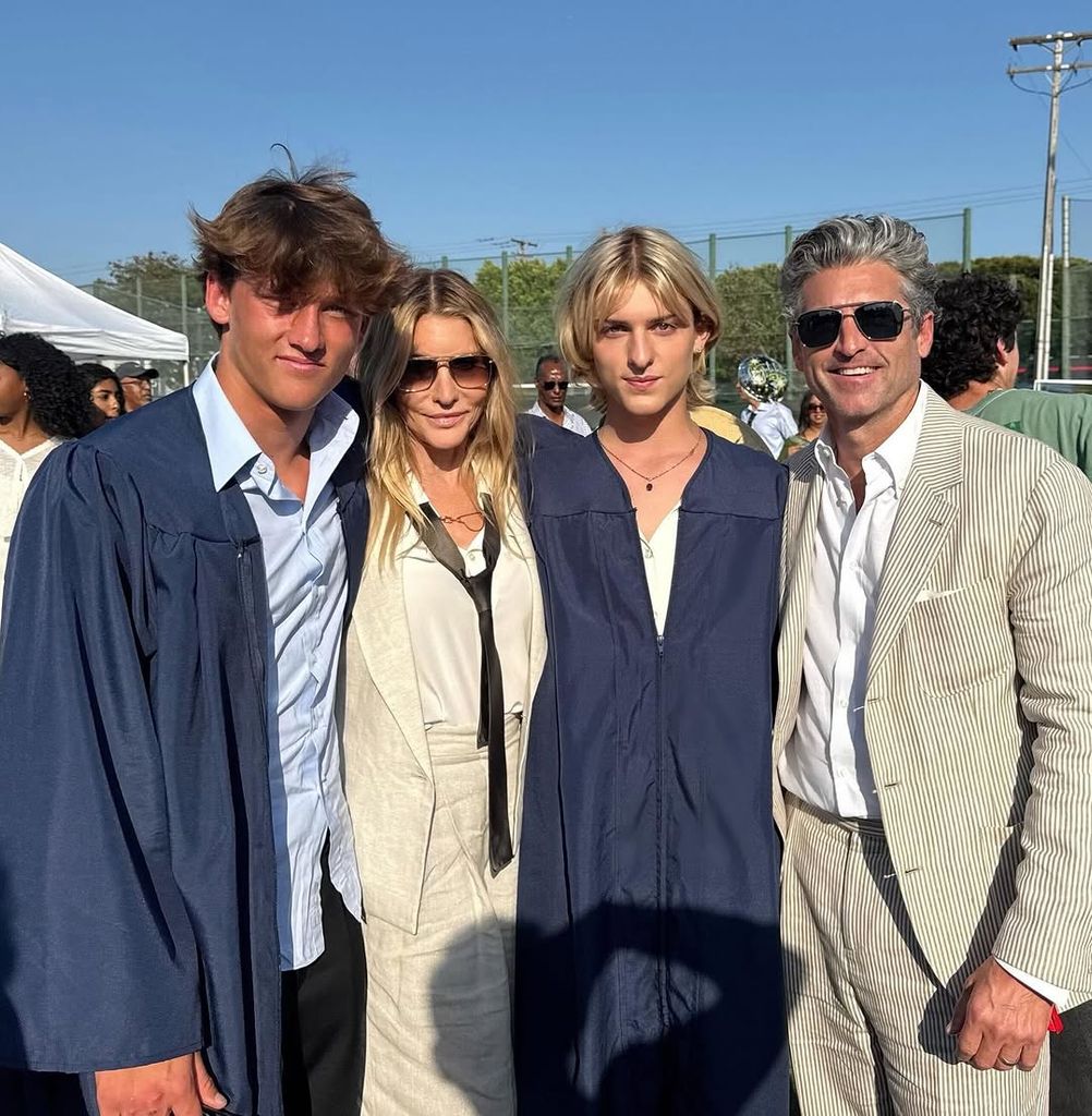 Patrick Dempsey and wife Jillian pose with sons Darby and Sullivan at their graduation