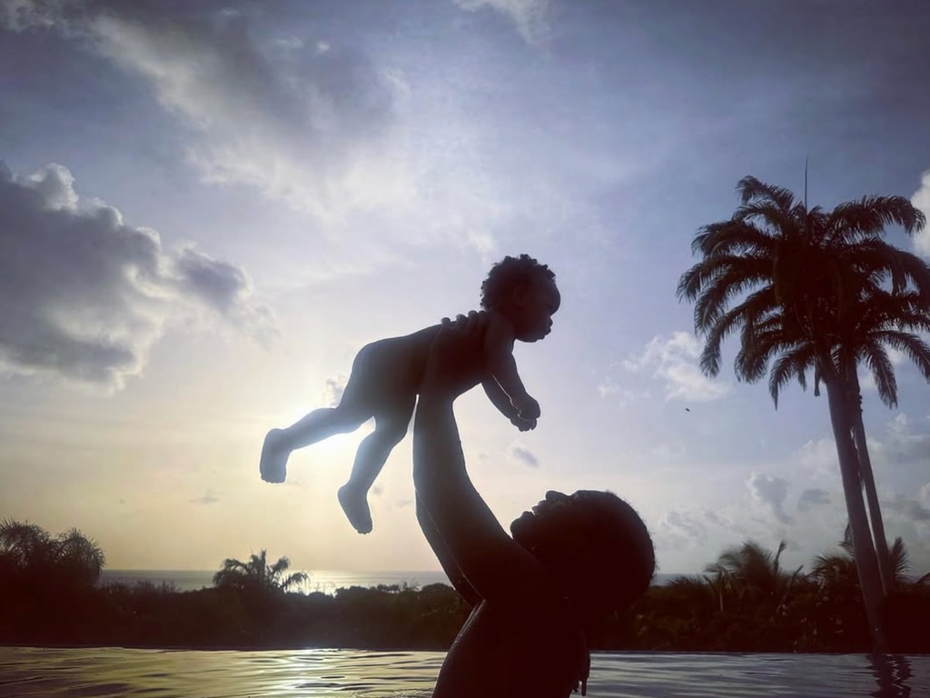 Photo shared by Rihanna on Instagram of A$AP Rocky with their son RZA