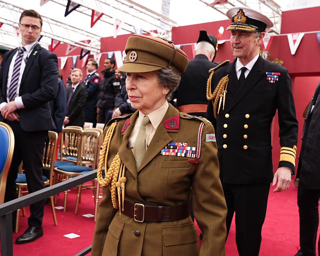 Princess Anne and Vice Admiral Sir Tim Laurence in military uniform