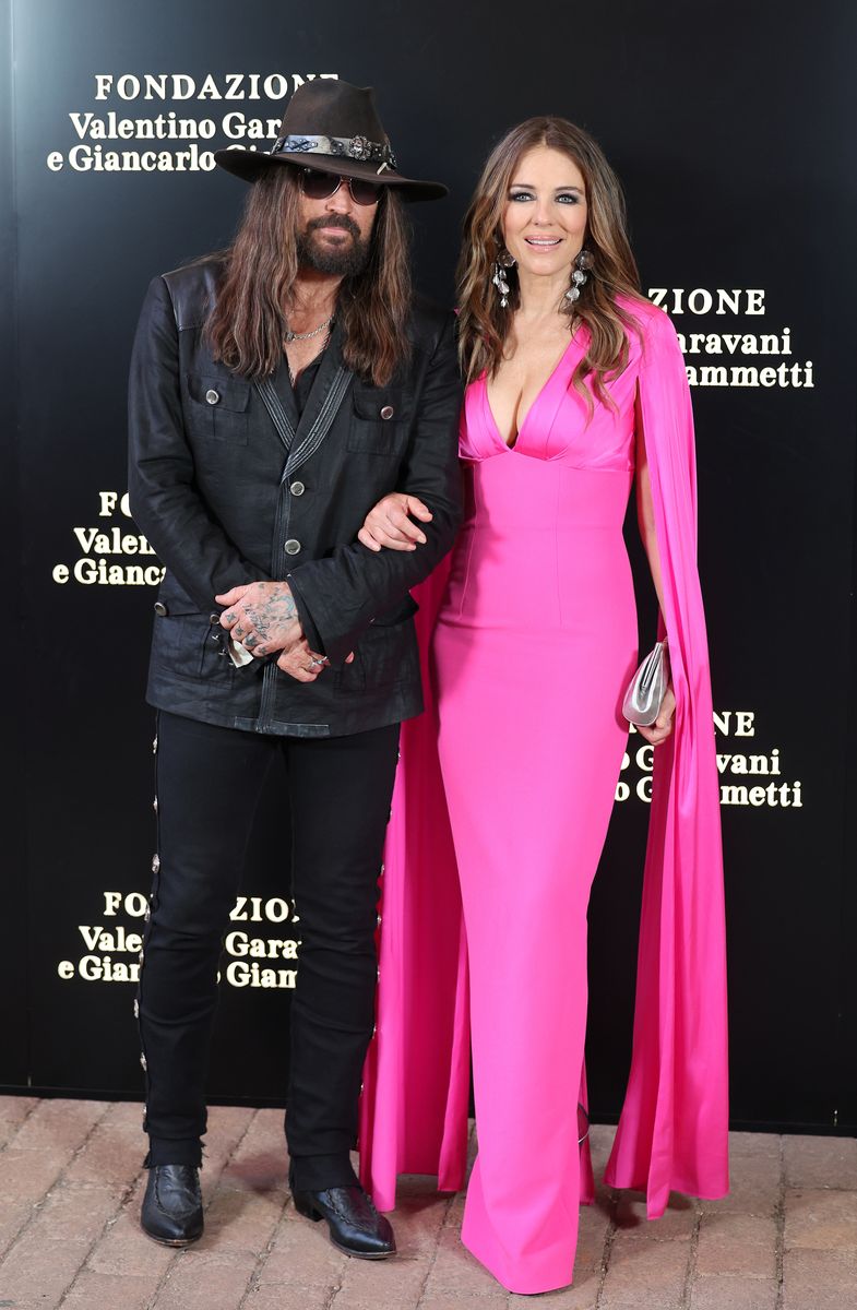 Billy Ray Cyrus and Elizabeth Hurley attend the "Orizzonti | Rosso" Exhibition Opening Dinner at Palazzo Barberini on May 24, 2025, in Rome, Italy. 