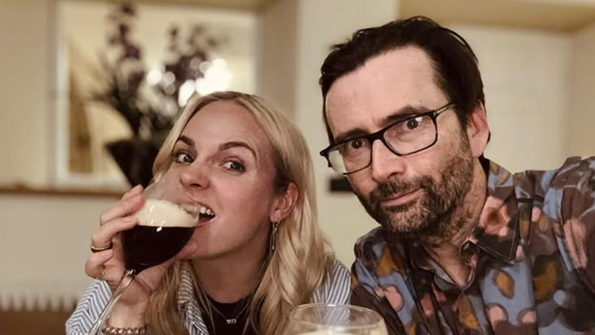 Georgia Tennant and David Tennant with glasses of alcohol