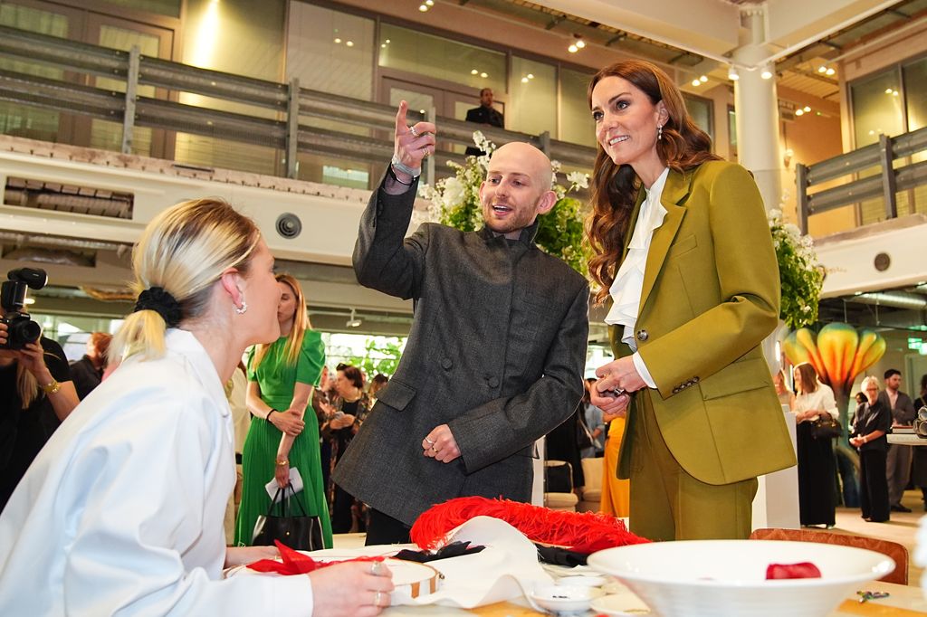 princess kate talking to designer patrick 