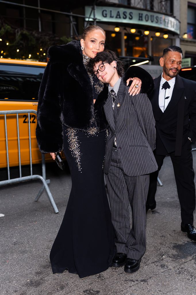 jennifer lopez with arm around child emme on nyc street