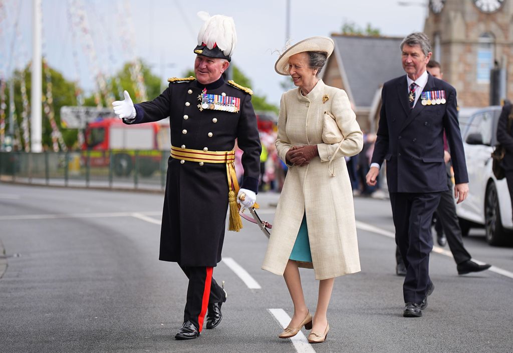 The Princess Royal's gloves contrasted her ensemble - making for a twist on her usual style