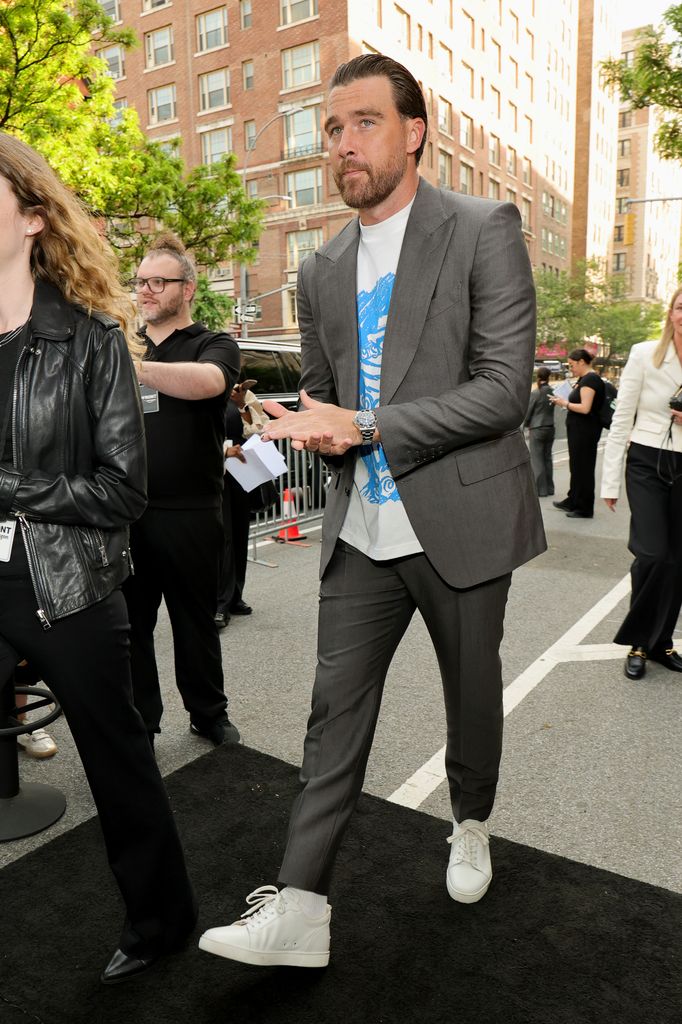 travis kelce in gray suit in nyc