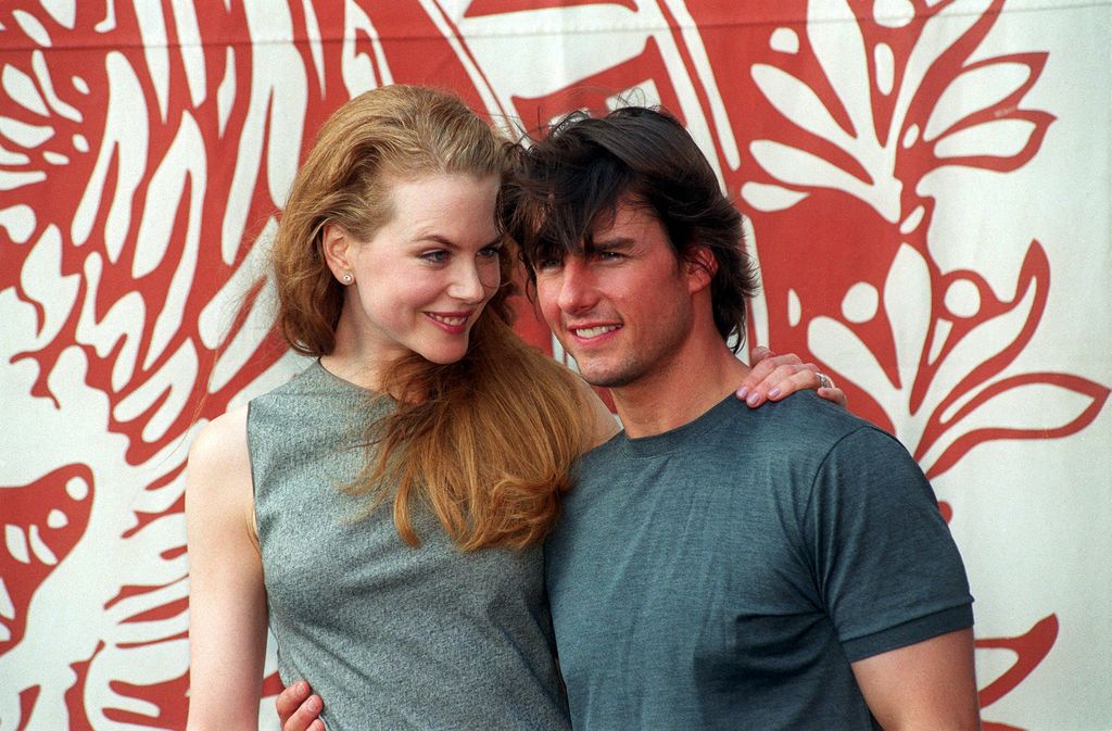 Nicole Kidman and Tom Cruise with their arms around each other