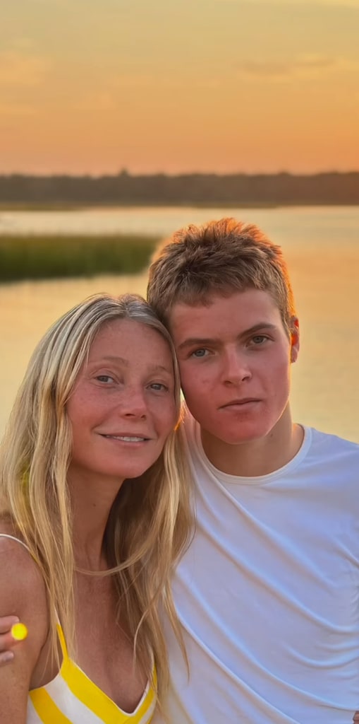 Still from a video shared by Gwyneth Paltrow on Instagram summer 2024 in which she is posing next to her son Moses Martin by the water at sunset