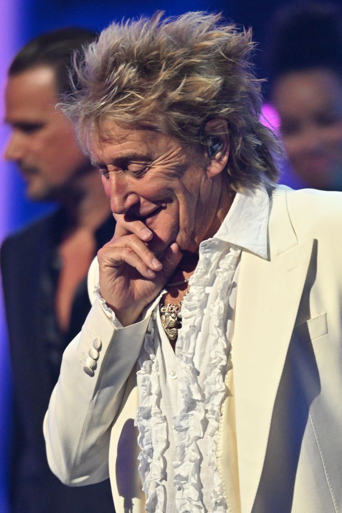 Rod Stewart reacts as he accepts the Lifetime Achievement Award onstage during the 51st American Music Awards