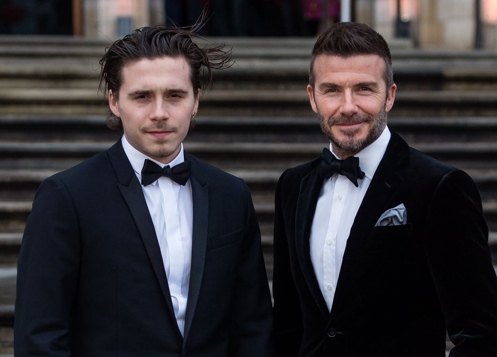 david beckham and son brooklyn in suits 