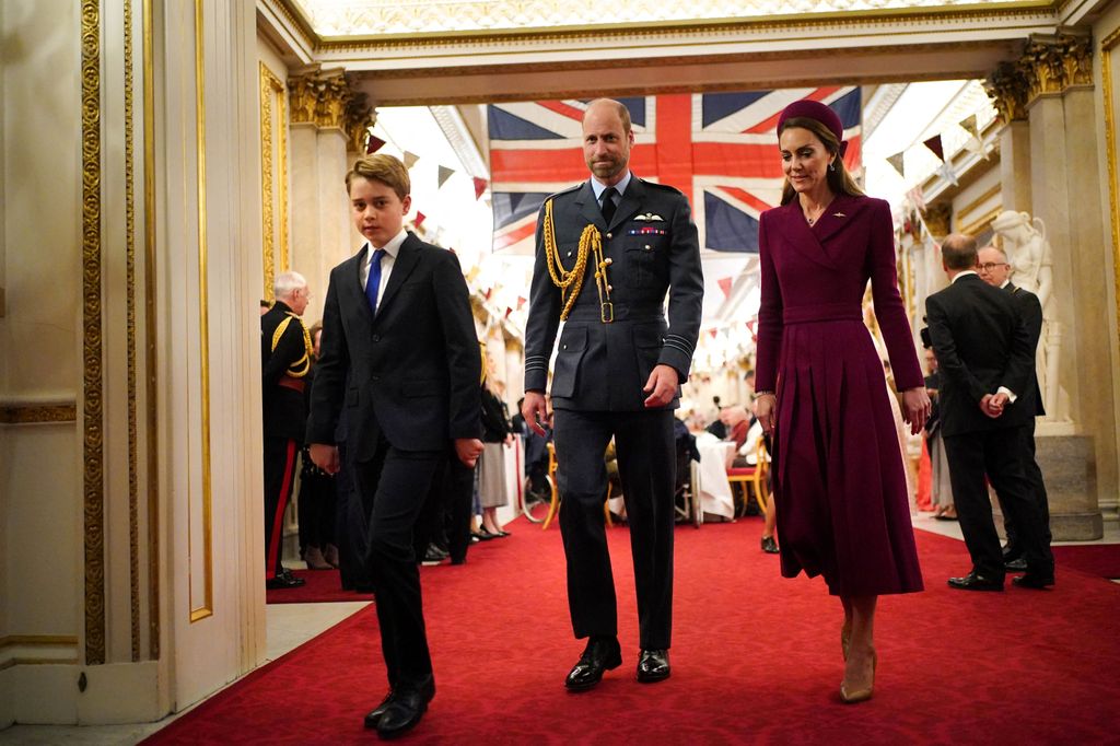 Prince George of Wales, Britain's Prince William, Prince of Wales and Britain's Catherine, Princess of Wales arrive for a tea party organised for Second World War veterans at Buckingham Palace 