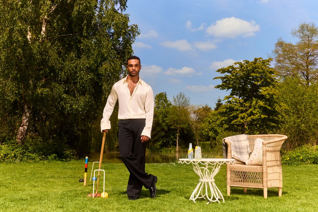 Lucien Laviscount with a croquet mallet