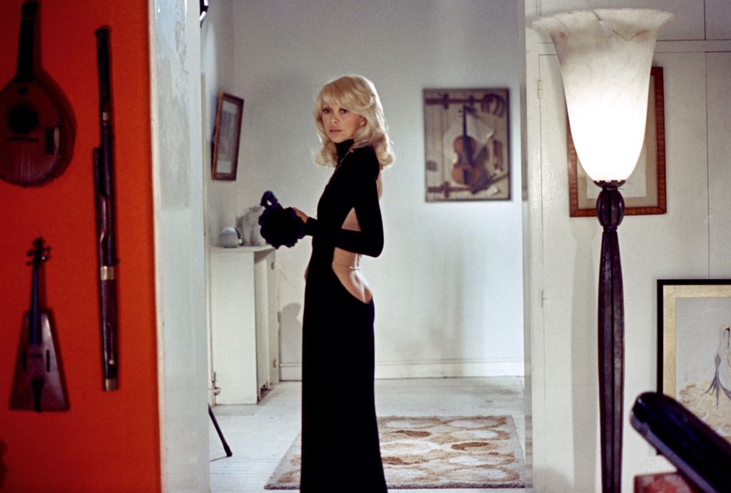 French actress Mireille Darc on the set of Le grand blond avec une chaussure noire