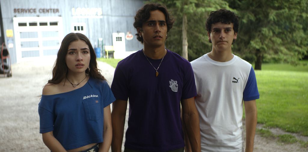 three teens looking shocked 