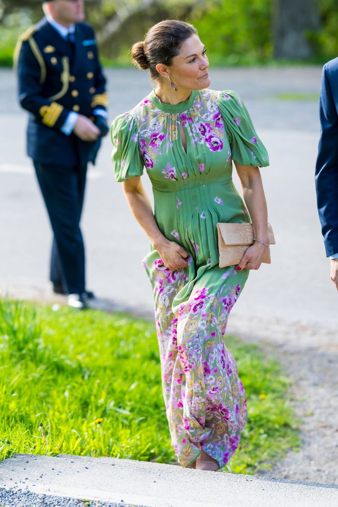 crown princess victoria walking in floral dress