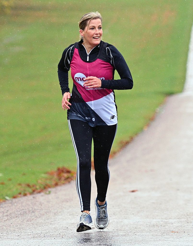sophie running marathon in rain
