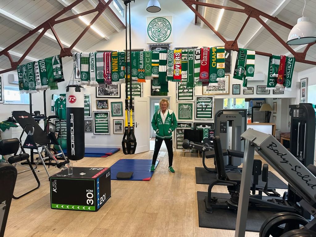 rod stewart standing in home gym 