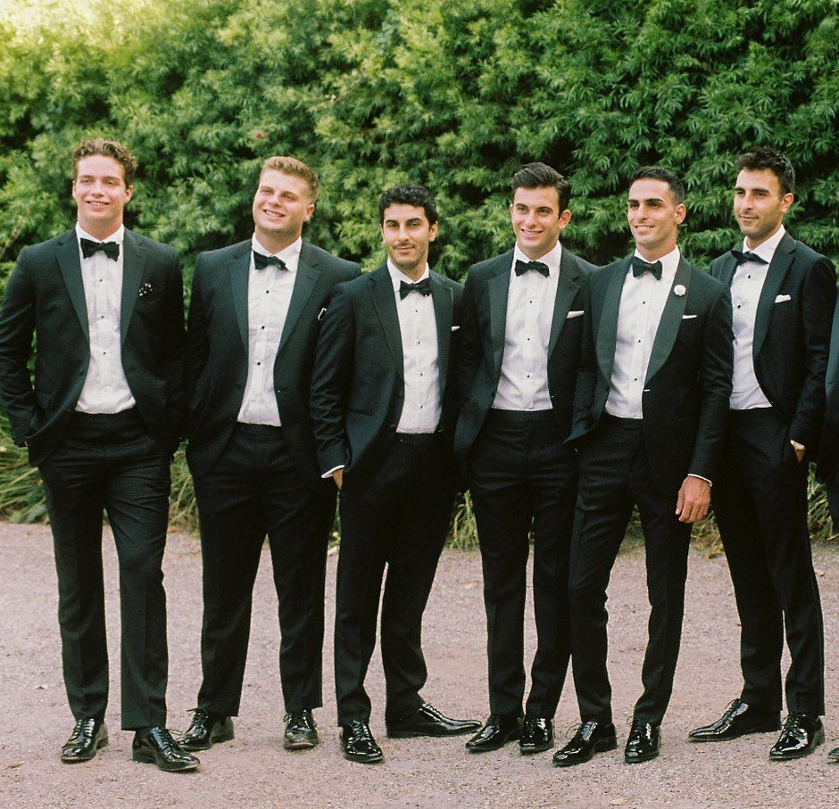 Don Diamont's six sons  poses in black tuxedos 