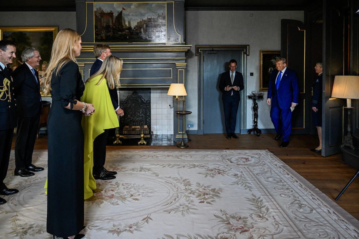 King Willem-Alexander (3rd L) and Queen Maxima (2nd L) of the Netherlands, along with Crown Princess Amalia (L), greet US President Donald Trump (R) prior to a social dinner with NATO country leaders at the 'Huis ten Bosch' Royal Palace, during a North Atlantic Treaty Organization (NATO) Heads of State and Government summit in The Hague, on June 24, 2025. NATO leaders hold a two-day summit on June 24 and 25 in The Hague. (Photo by Mischa Schoemaker / POOL / AFP) (Photo by MISCHA SCHOEMAKER/POOL/AFP via Getty Images)          