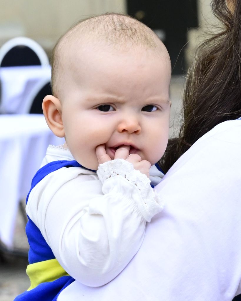 Princess Ines with fingers in her mouth
