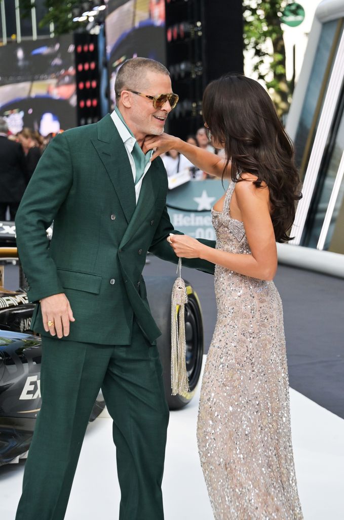 bradd pitt and ines de ramon on red carpet