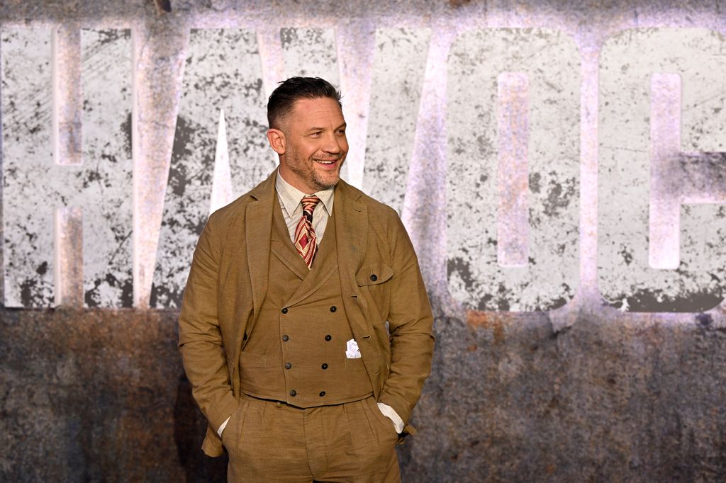 Tom Hardy smiling at the Havoc World Premiere