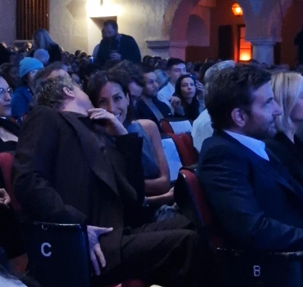 Brad Pitt whispers in girlfriend Ines' ear