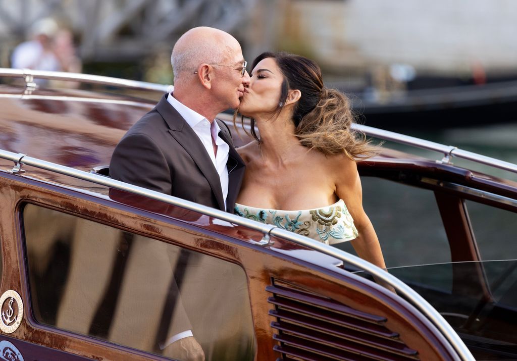 Jeff Bezos and Lauren Sanchez leave the Aman Hotel on Thursday evening