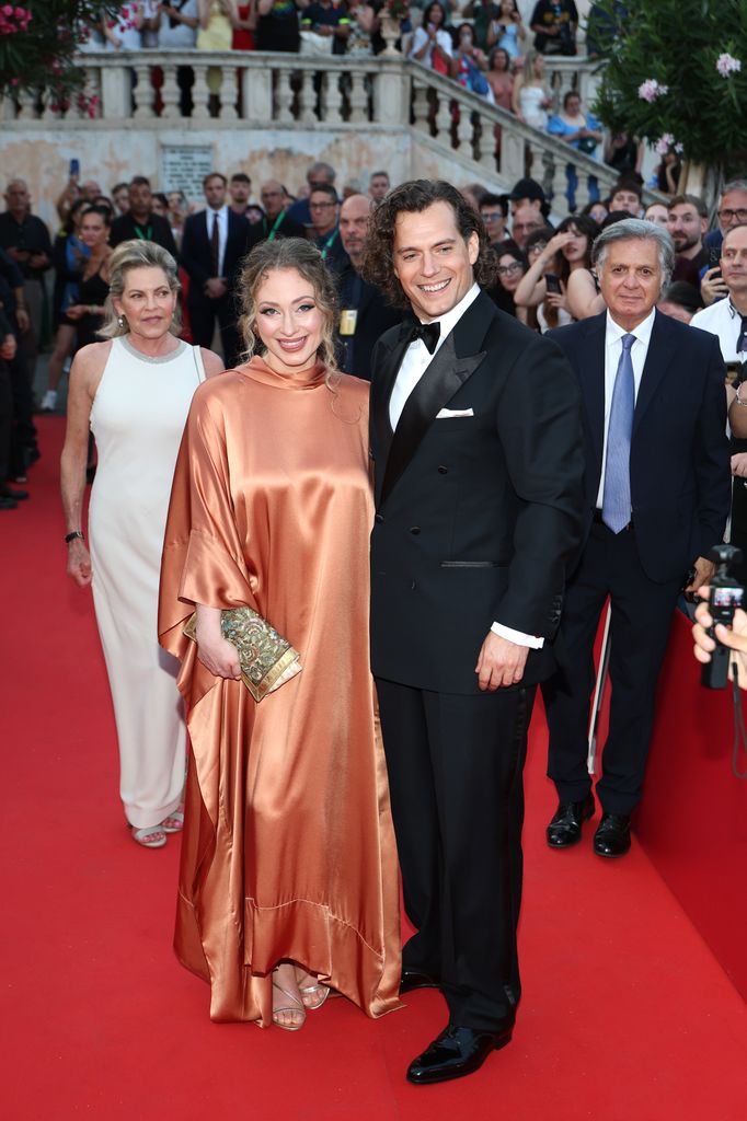 henry cavill and natalie viscuso on red carpet in italy