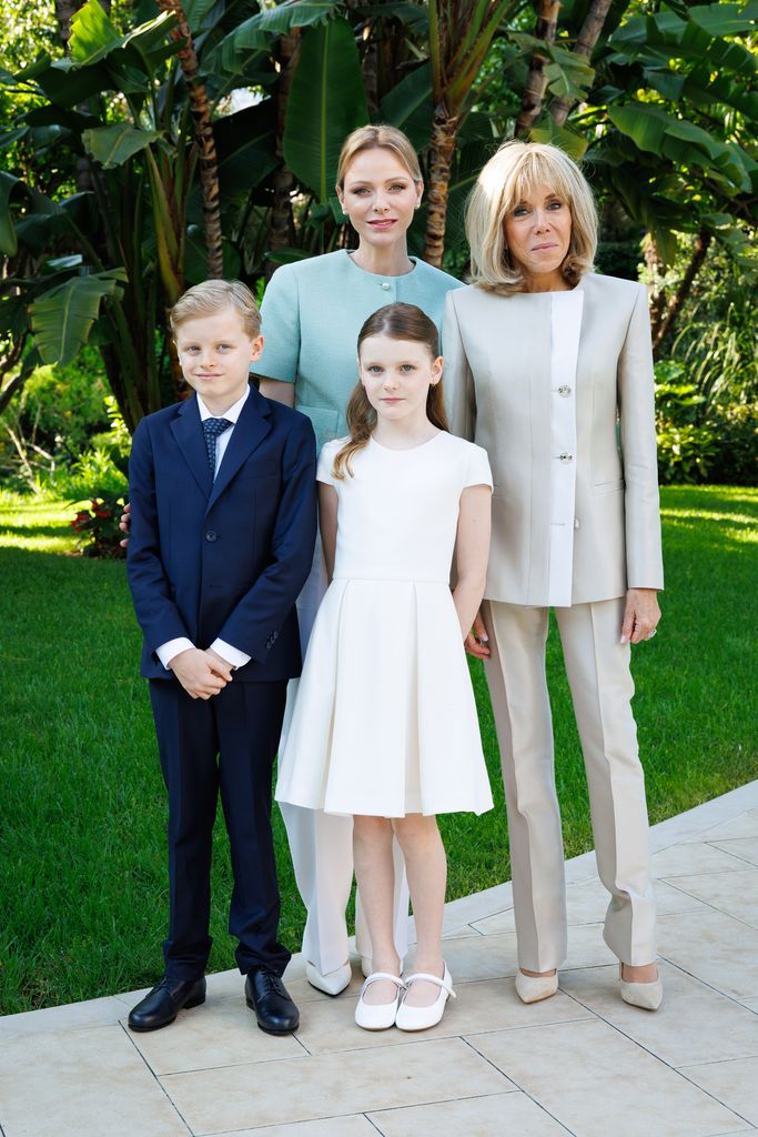 Princess Charlene in a blue jacket with her twins and French First Lady Brigitte Macron