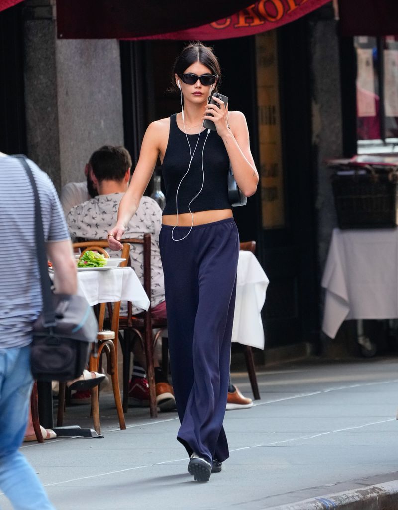 Kaia Gerber is seen in SoHo un black tank top