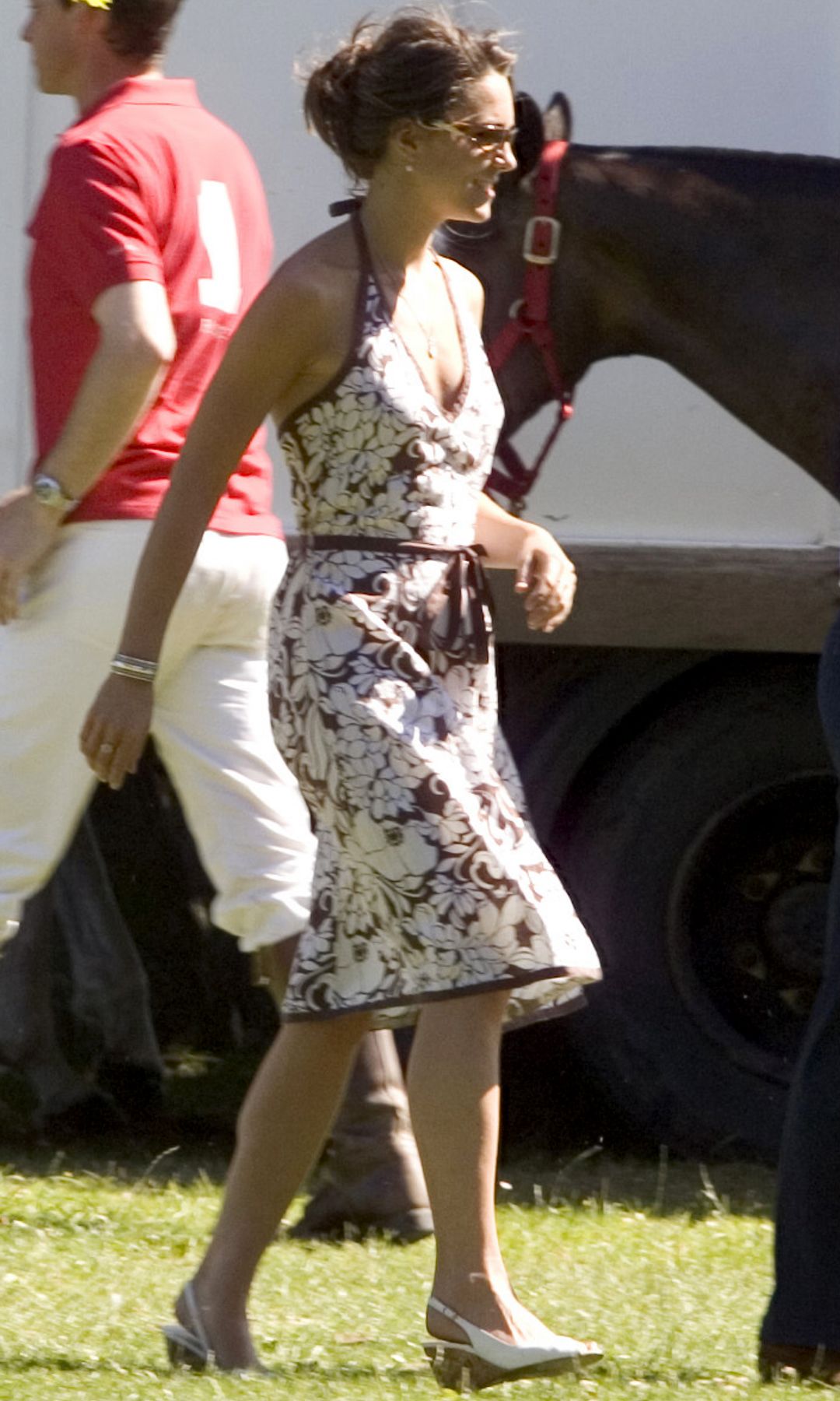 Kate Middleton in a brown halterneck dress