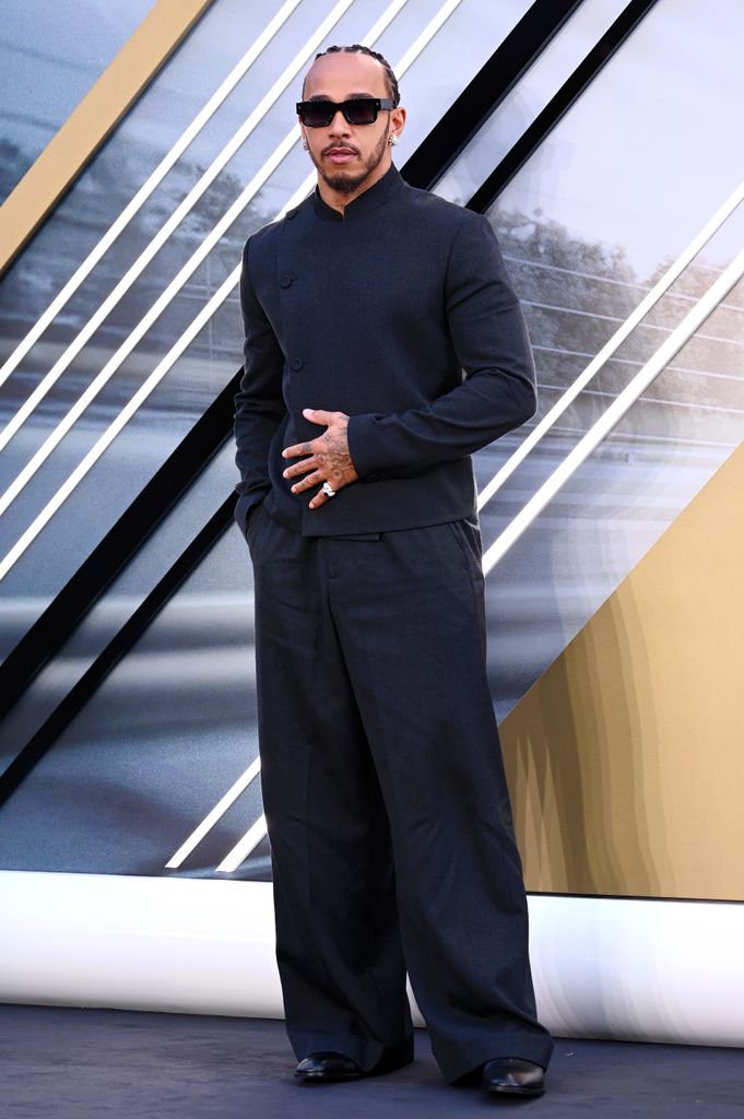 lewis hamilton posing on red carpet