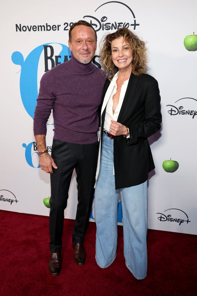 tim mcgraw and faith hill on red carpet in casual clothes