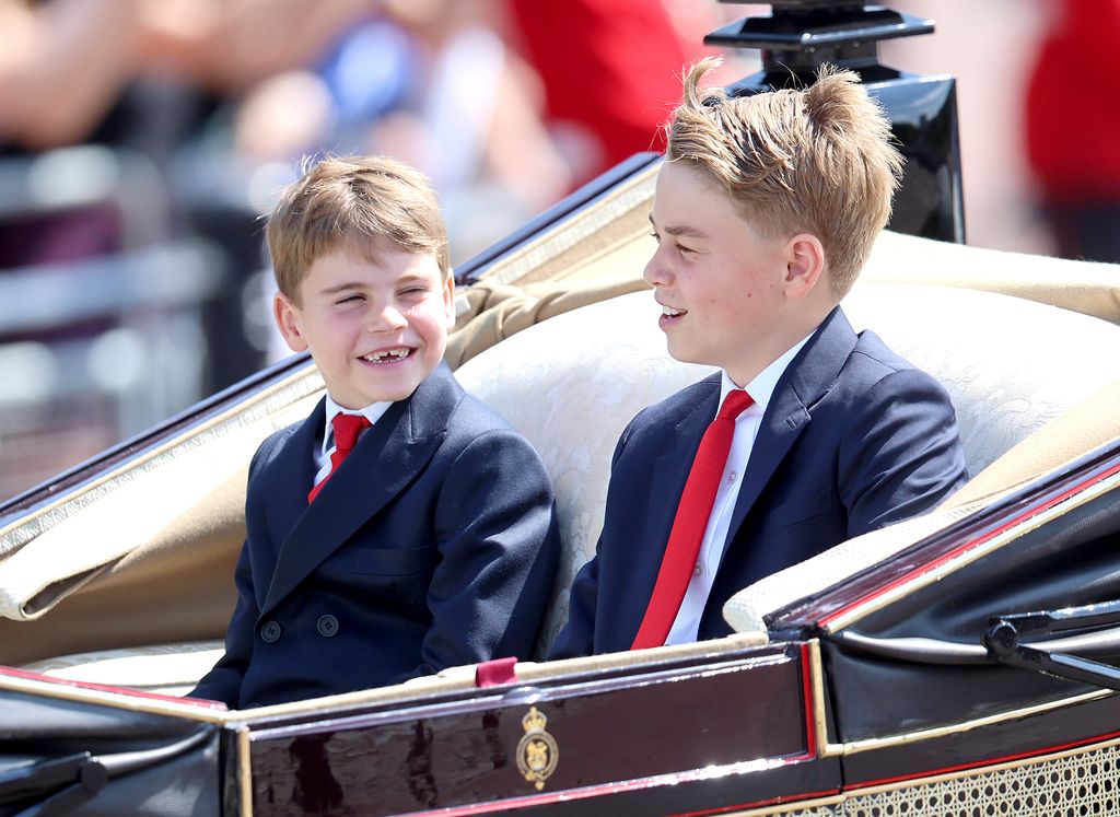 Prince George of Wales and Prince Louis of Wales travel by carriag during Trooping The Colour 2025 on June 14, 2025 in London, England. Trooping The Colour is a ceremonial parade celebrating the official birthday of the British Monarch. The event features over 1,400 soldiers and officers, accompanied by 200 horses. More than 400 musicians from ten different bands and Corps of Drums march and while performing.