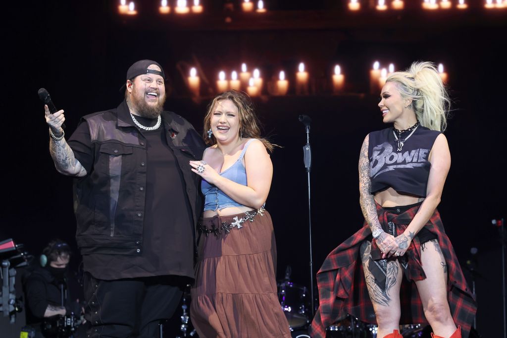INDIO, CALIFORNIA - APRIL 26: (FOR EDITORIAL USE ONLY) (L-R) Jelly Roll, Bailee Ann and Bunnie Xo are seen at the T-Mobile Mane Stage during the 2024 Stagecoach Festival at Empire Polo Club on April 26, 2024 in Indio, California. (Photo by Amy Sussman/Getty Images for Stagecoach)
