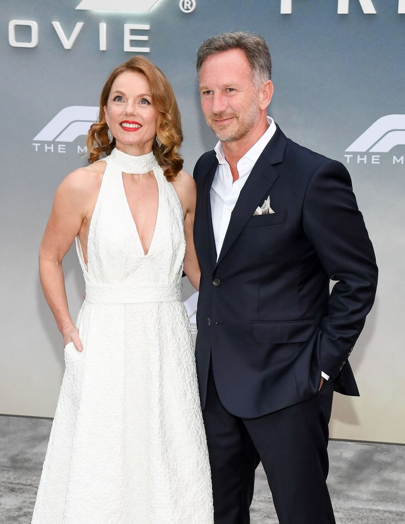 geri horner in white dress and christian horner in navy suit and white shirt 