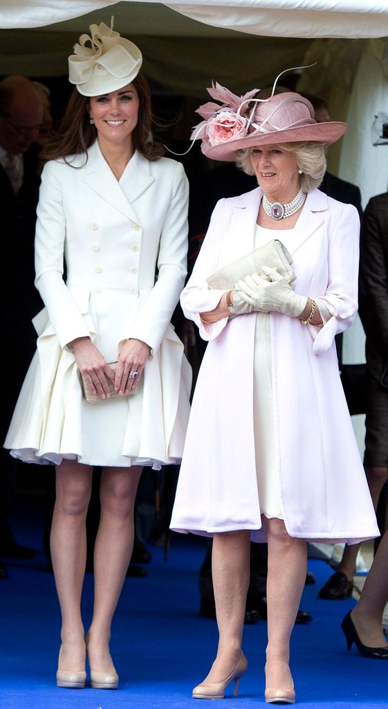 The-then duchess of Cambridge also wore the dress to Garter Day in 2012, paired with a matching ivory headpiece