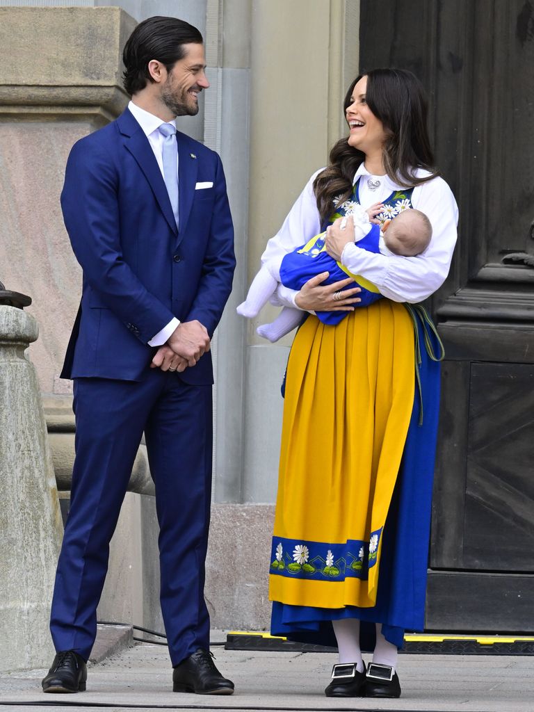 Prince Carl Philip smiling at Princess Sofia and Princess ines