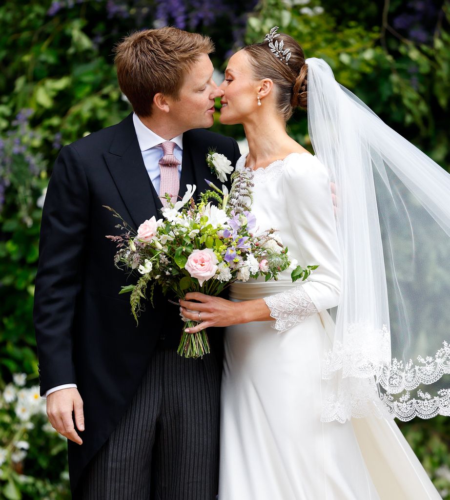 Hugh Grosvenor, Duke of Westminster and Olivia Grosvenor, Duchess of Westminster kiss as they leave Chester Cathedral following their wedding ceremony
