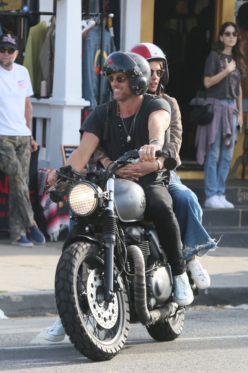 Alessandra Ambrosio’s motorcycle moment with Buck Palmer screams summer romance