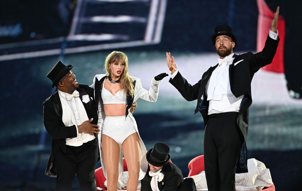 Taylor Swift and Travis Kelce on stage during The Eras Tour in London